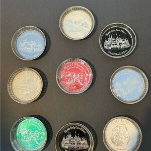 Nine collectible metal drink coaster collection 1960s